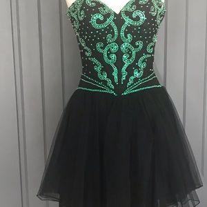 Sherri Hill black cocktail it’s green stones